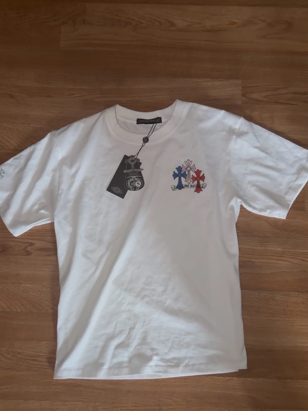 WHITE CHROME HEART SHIRT WITH TAGS SIZE SMALL.